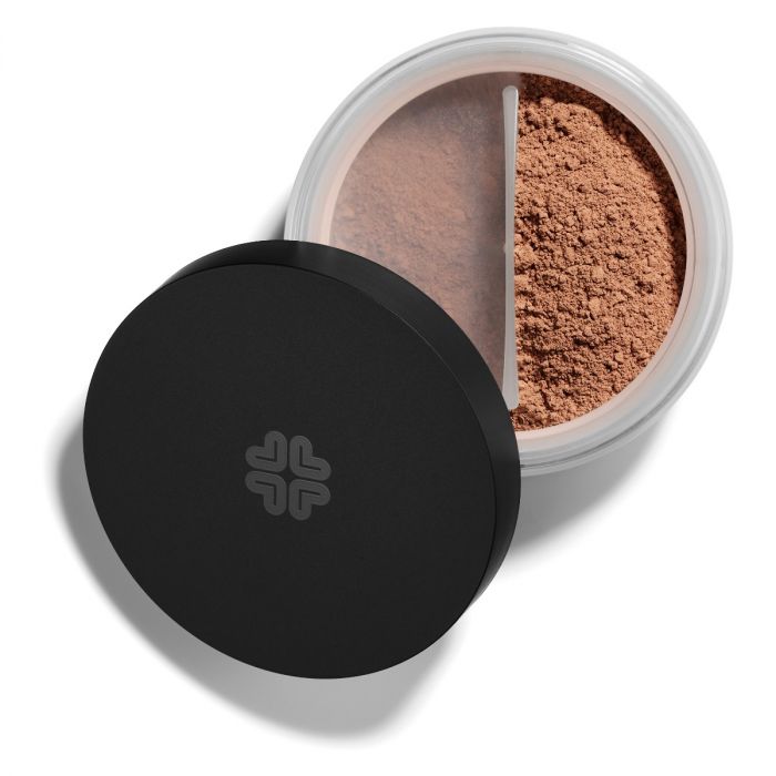 Lily Lolo Dusky Mineral Foundation: Gluten free, vegan. A tan foundation shade with balanced undertones.